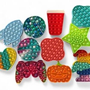 Bundle of Pop It’s 11 piece bundle Santa Game Controller